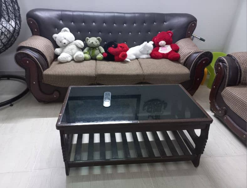 seven seater sofa set with central wooden glass table 6