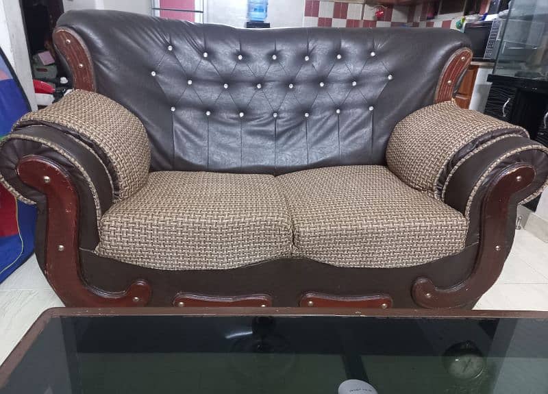 seven seater sofa set with central wooden glass table 7