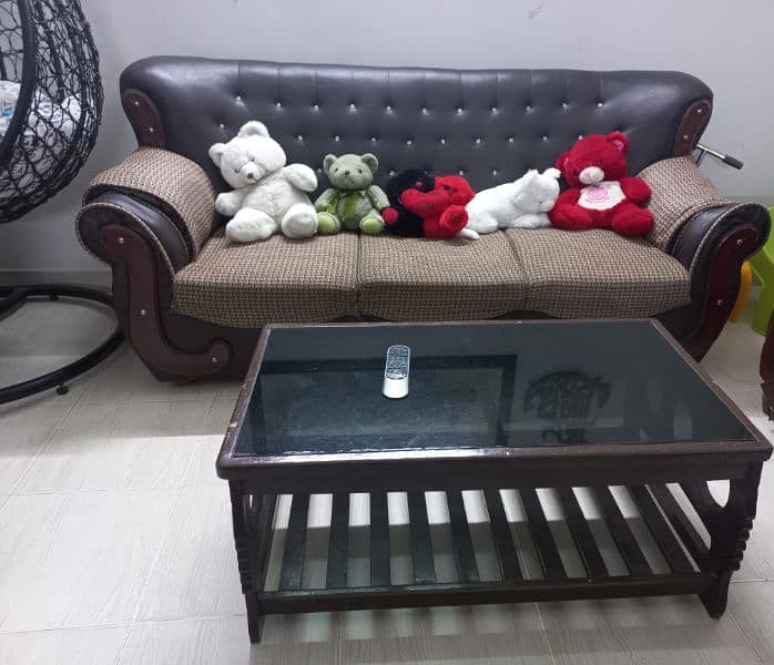 seven seater sofa set with central wooden glass table 8