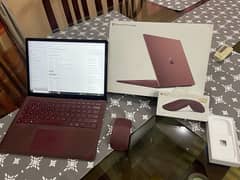 microsoft surface laptop with original wireless mouse