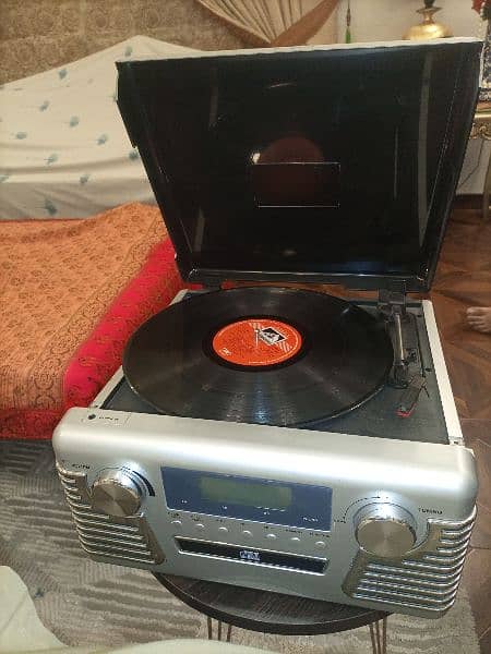 3 Speed Record Player with Radio and CD. 0