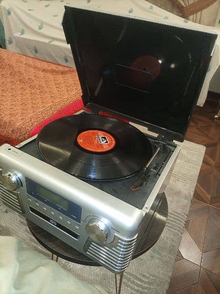 3 Speed Record Player with Radio and CD. 5