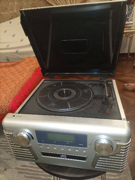 3 Speed Record Player with Radio and CD. 8