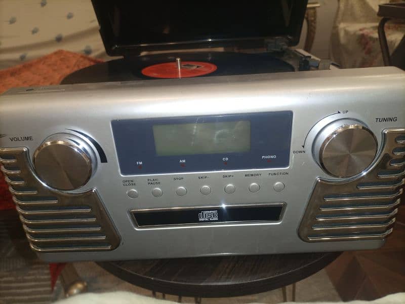 3 Speed Record Player with Radio and CD. 9