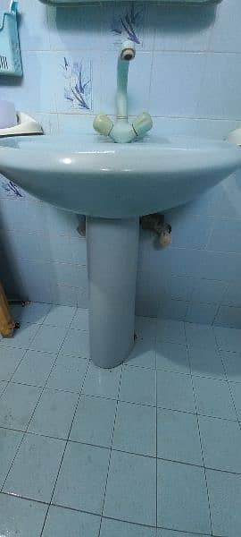 Sky blue commode and wash basin 6
