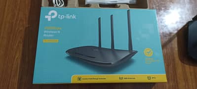TP links signals range enhancer and router