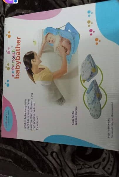 mother touch baby bather 0