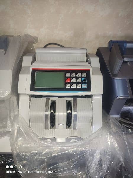 Bank currency, Cash note counting machine with fake detection Pakistan 1