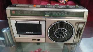 old antique tape recorder and radio
