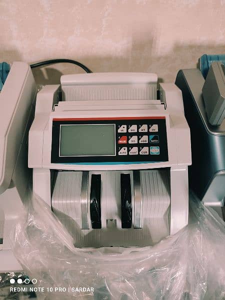 cash currency note bill counting machine with fake note detection SMI. 9