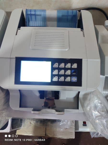 cash currency note bill counting machine with fake note detection SMI. 13