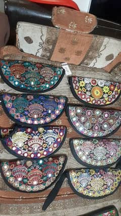 Hand Embroided D shapes clutches 0