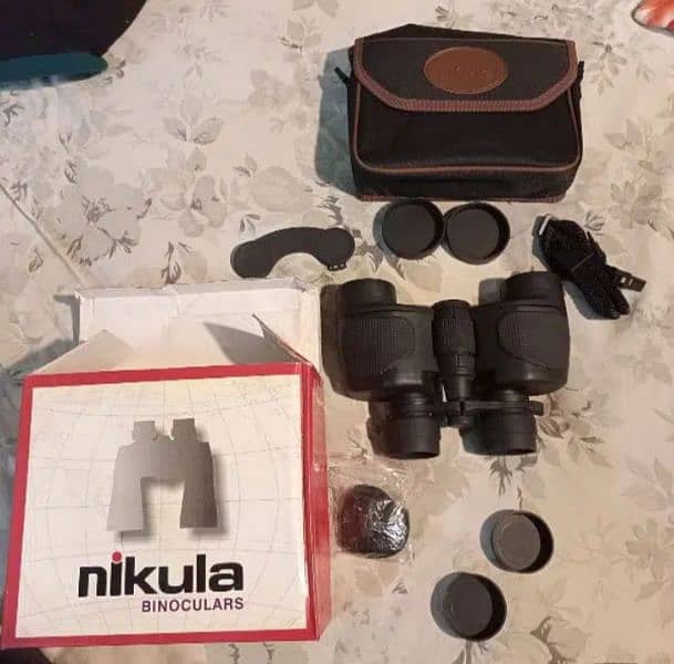 Nikula binocular 7-15x35mm. Made in Arizona, usa. 1