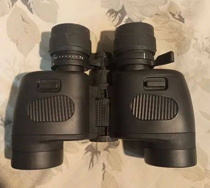 Nikula binocular 7-15x35mm. Made in Arizona, usa. 6
