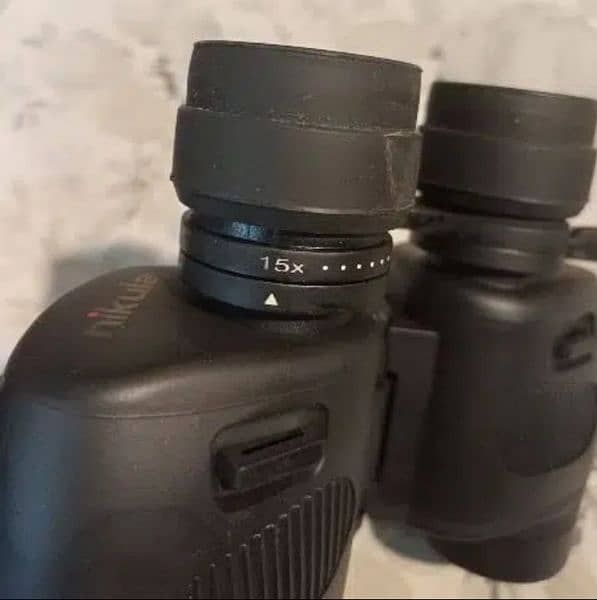 Nikula binocular 7-15x35mm. Made in Arizona, usa. 8