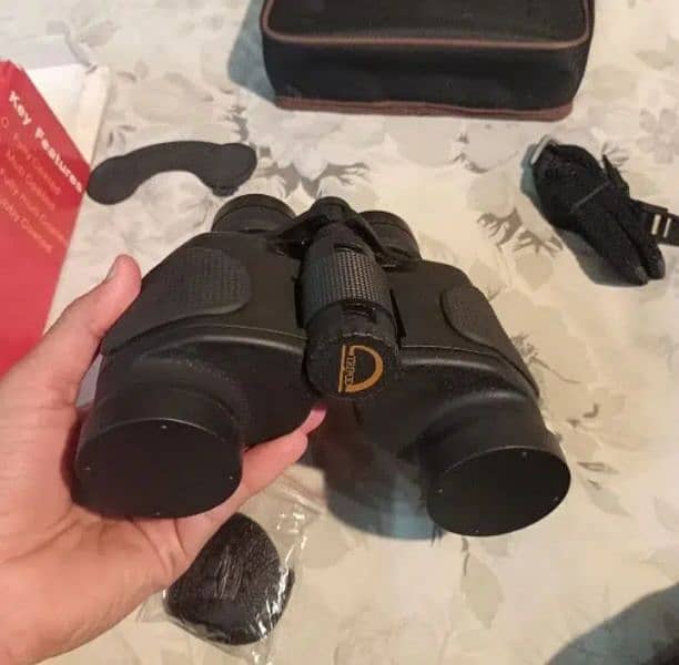 Nikula binocular 7-15x35mm. Made in Arizona, usa. 12
