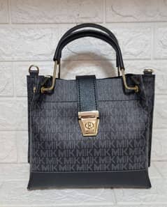 Ladies Michael Kors
Hand Bag