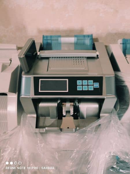 SM-2100 Cash counting,note counter Packet sorting machine in Pakistan 1