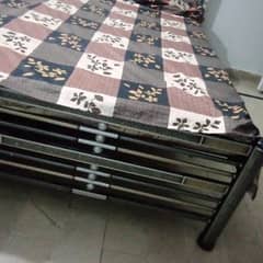 iron two single beds only 8 months used reason of sell congested area