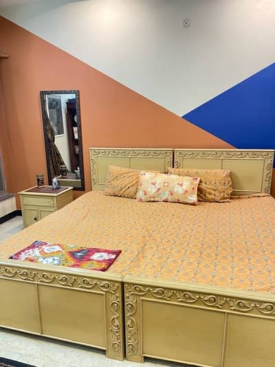 Two single beds and 1 centre table