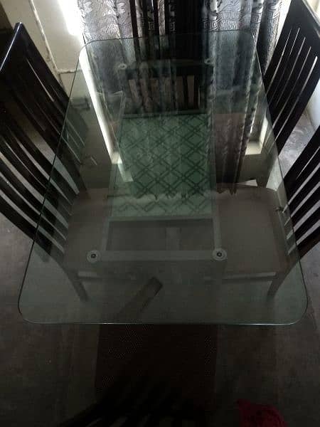 6 seater glass top dining table with 2nd shelf 1