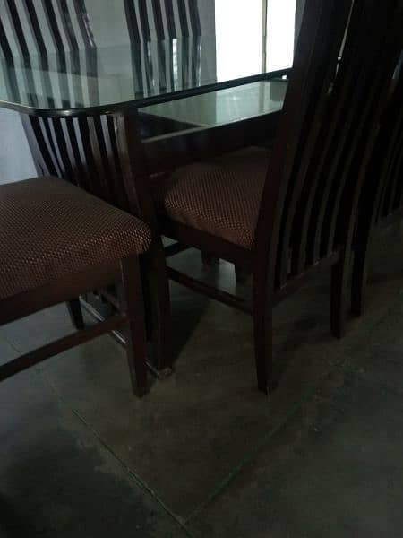 6 seater glass top dining table with 2nd shelf 3