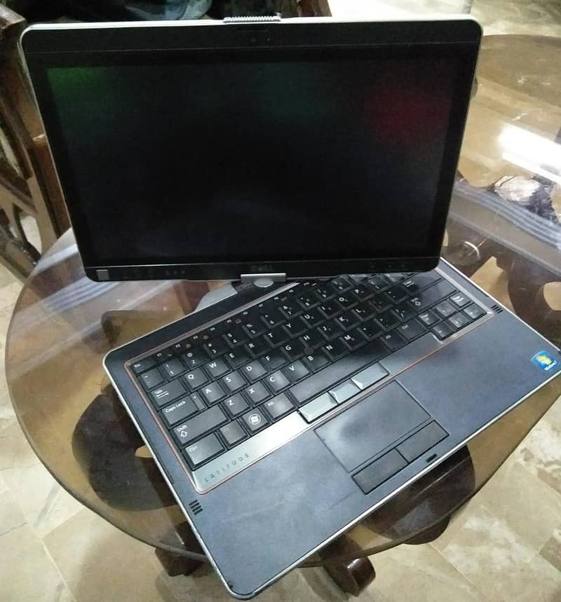 Dell XT Touch Screen Processor: i3 2.20ghz (2nd Generation) 3