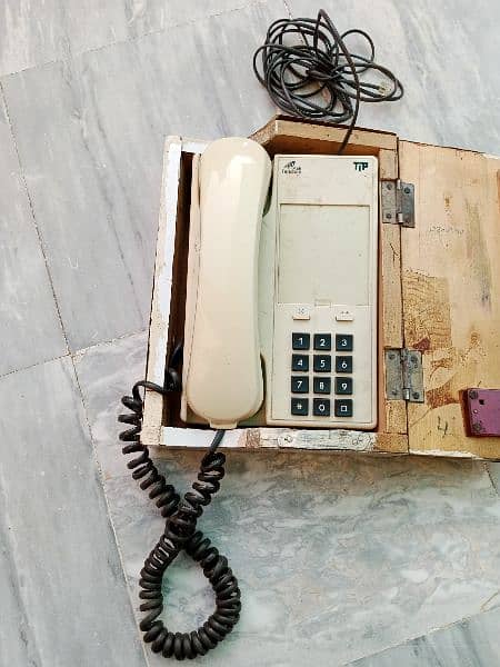 PTCL phone with box two keys and Phone stand 1