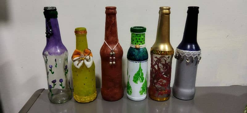 masala bottles 4 bottles set in only 300 +hand painted bottles  200 1