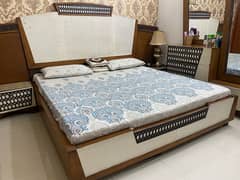 bedset along with dressing table