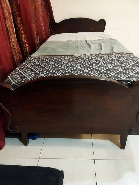 2 single wooden bed 1