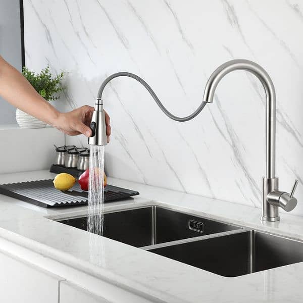 Kitchen Sink Faucet, Stainless Steel with Pull Down Spray. 1