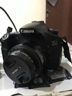 Canon 60d body and 50mm with original box and accessories