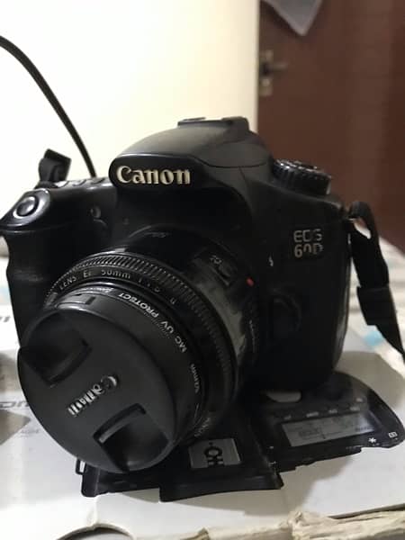 Canon 60d body and 50mm with original box and accessories 0