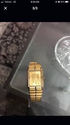 swister gold plated watch.