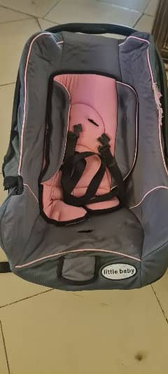 carry cot/ car seat both are in good condition each price 6000Rs