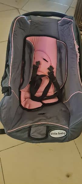 carry cot/ car seat both are in good condition each price 6000Rs 0