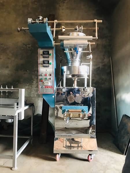 New Packing Machine For Powder Pulses Rice Spices Surf Nimko Chips etc 1