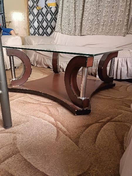 one big and 2 small tables in very good condition 4