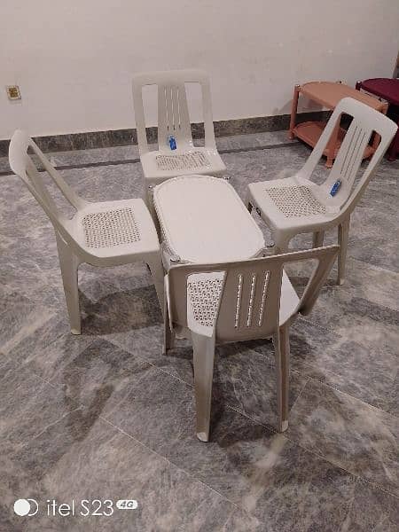 Plastic chairs and table set 4+1 ( Maroon, Off white, Grey, Peach) 1