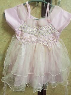 baby girl fancy frock in baby pink colour