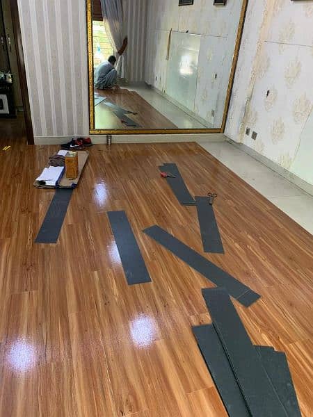 imported vinyl wood floor, wallpaper, window blinds, Astro turf 1