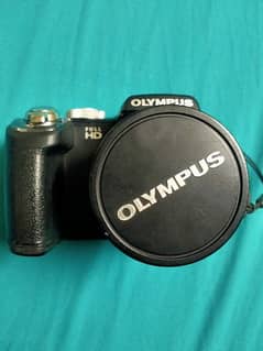 Olympus SP-720UZ DSLR camera