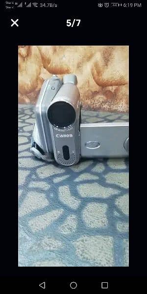 canon Dvd camcorder and still like new condition with all accessories 2