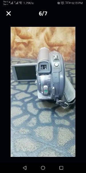canon Dvd camcorder and still like new condition with all accessories 5