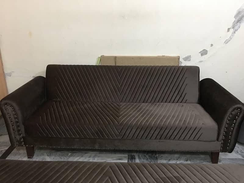 Two piece  Sofa cum  Bed in Brown colour. 3