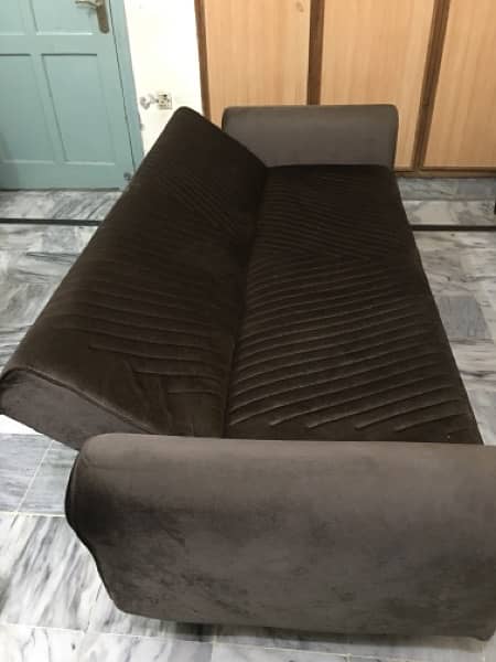 Two piece  Sofa cum  Bed in Brown colour. 5