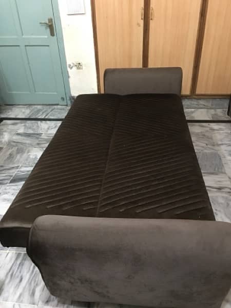 Two piece  Sofa cum  Bed in Brown colour. 6