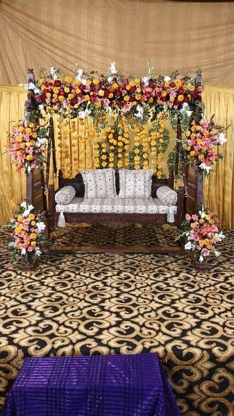 Wooden swing with decorations 0