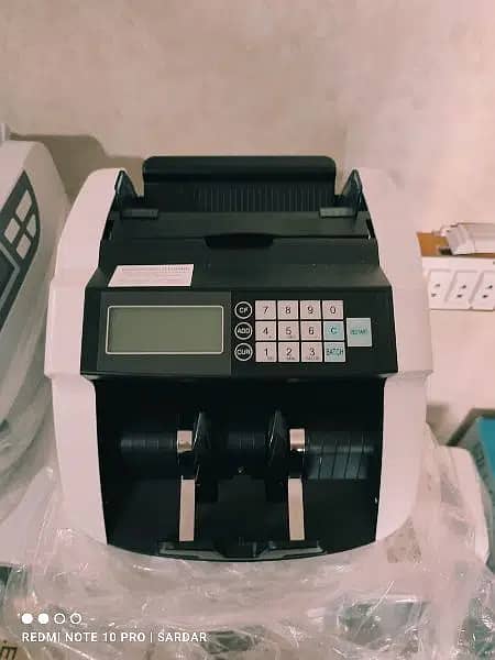 cash counting Machine, mix note counting with fake detection Pakistan 2